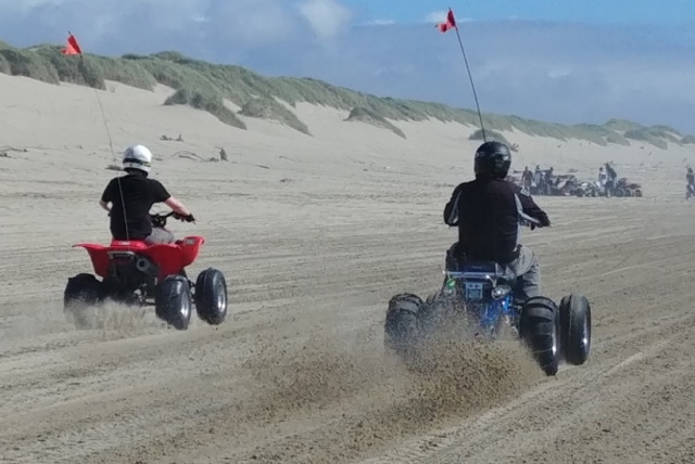Sand dune riding on ATVs